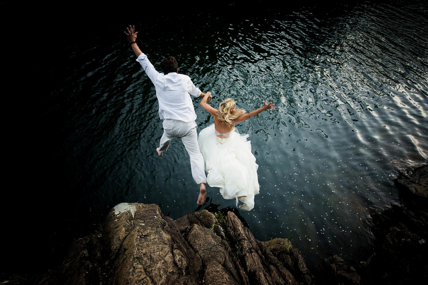 Waterfall trash the dress in Belize.  Belize wedding photographers, Leonardo Melendez Photography.